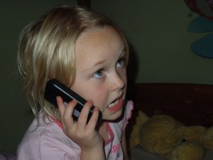 Lara on her mobile phone