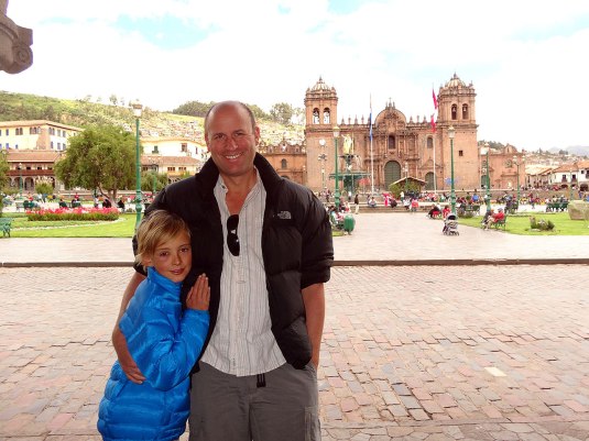 Swollen Eyed Boy with dad at Plaza de Las Armas
