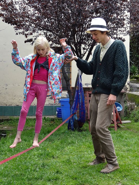 Zoe tries slacklining - like a tightrope! We tried in the Galapagos too, this is a popular think in South America