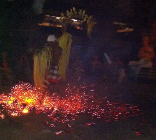 Dancing on burning coconuts at the Kecak Dance
