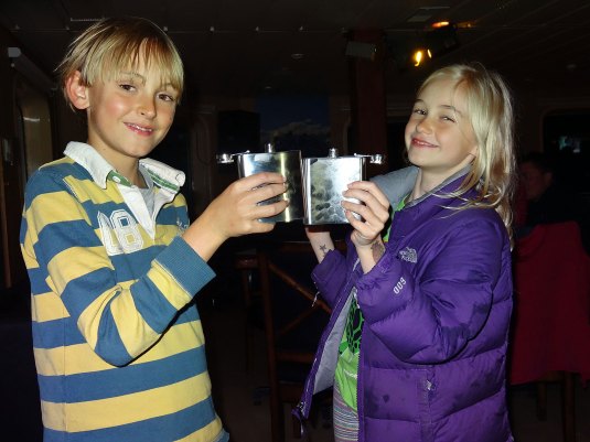 Proudly displaying their new Navimag hipflasks!