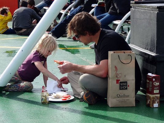 Lara shares some snacks with a friend she's made! 