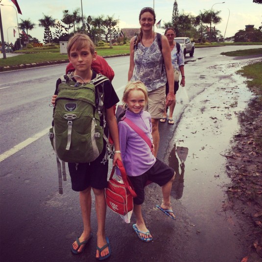 Big brother helps out Lazy Lara with her bag! 